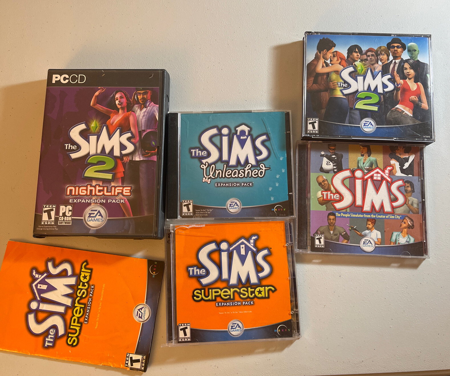 the sims bundle( sims 1, sims 2, sims the superstar pack, the sims 2