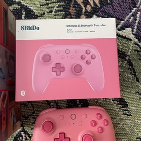 NINTENDO SWITCH W/ BOX, PINK 8 BITDO ULTIMATE 2C, KIRBY CASE SD CARD ADULT OWNED
