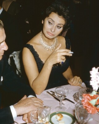 Sophia Loren smoking cigarette candid vintage at event 24x36 inch Poster