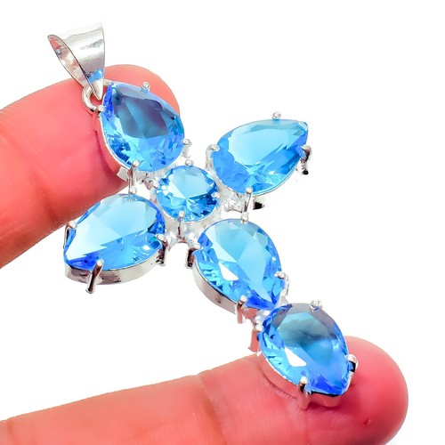 Colgante de corte de pera cruzada de piedra preciosa de topacio azul suizo hecho a mano de plata esterlina 925 - Imagen 2 de 3