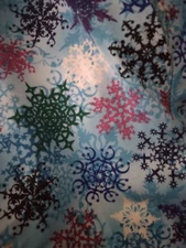 Woman scrub Top SB Brand. Size Small Blue W/Snowflakes EXCELLENT USED CONDITION