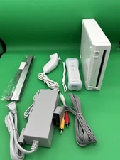 GUARANTEED Nintendo Wii Console + New Controllers + New cables REGION FREE