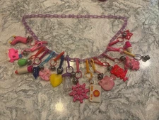VINTAGE 1980’S BELL CHARM NECKLACE WITH 15 80’S PLASTIC CHARMS