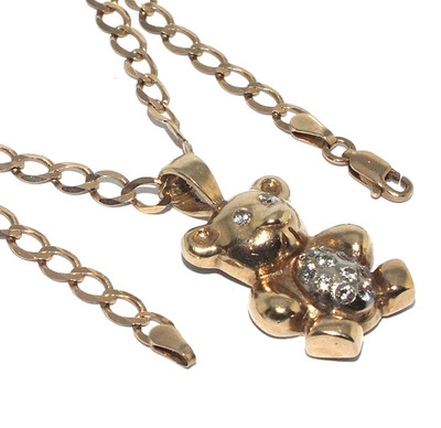 Niedlicher Teddybär-Anhänger Damen 9 kt Gelbgold mit Steinen an einer Panzerkette besetzt