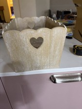 Small white wash effect wooden box with heart handles used.