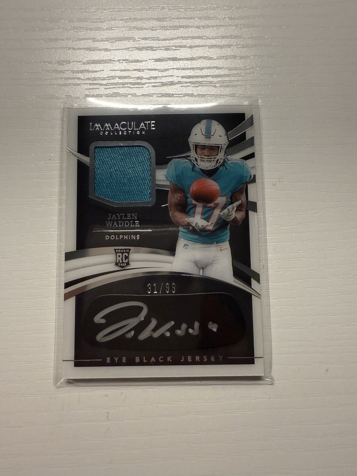 2021 Panini Immaculate -Eye Black Jersey #REB-JW Jaylen Waddle /99 (AU, MEM, RC)