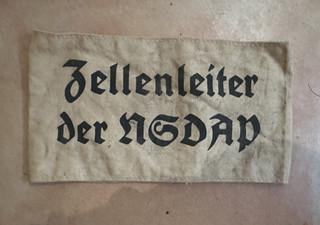 WW2 GERMAN ARMBAND ORIGINAL WARTIME WITH UNIT AND DATE INSIDE.