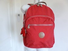 NEUF GRAND SAC A DOS  MARQUE  KIPLING  TOILE DEPERLANTE ROUGE + SINGE