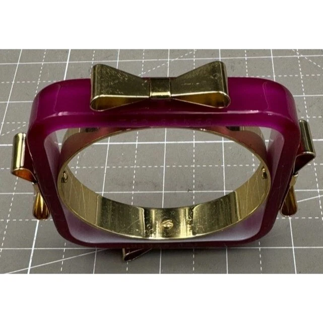 Pulsera cuadrada Ted Baker con arco dorado púrpura para mujer de 2 1/2" de diámetro Foto 2 de 3