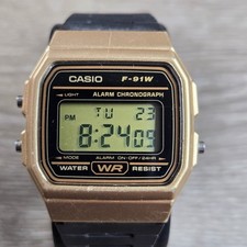 Casio F-91W Digital Watch Gold Tone Chronograph Black Resin Strap Alarm 593