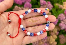 Mystic Firefly Bracelet Lampwork Luminous Glass Glow in the Dark Red White Blue