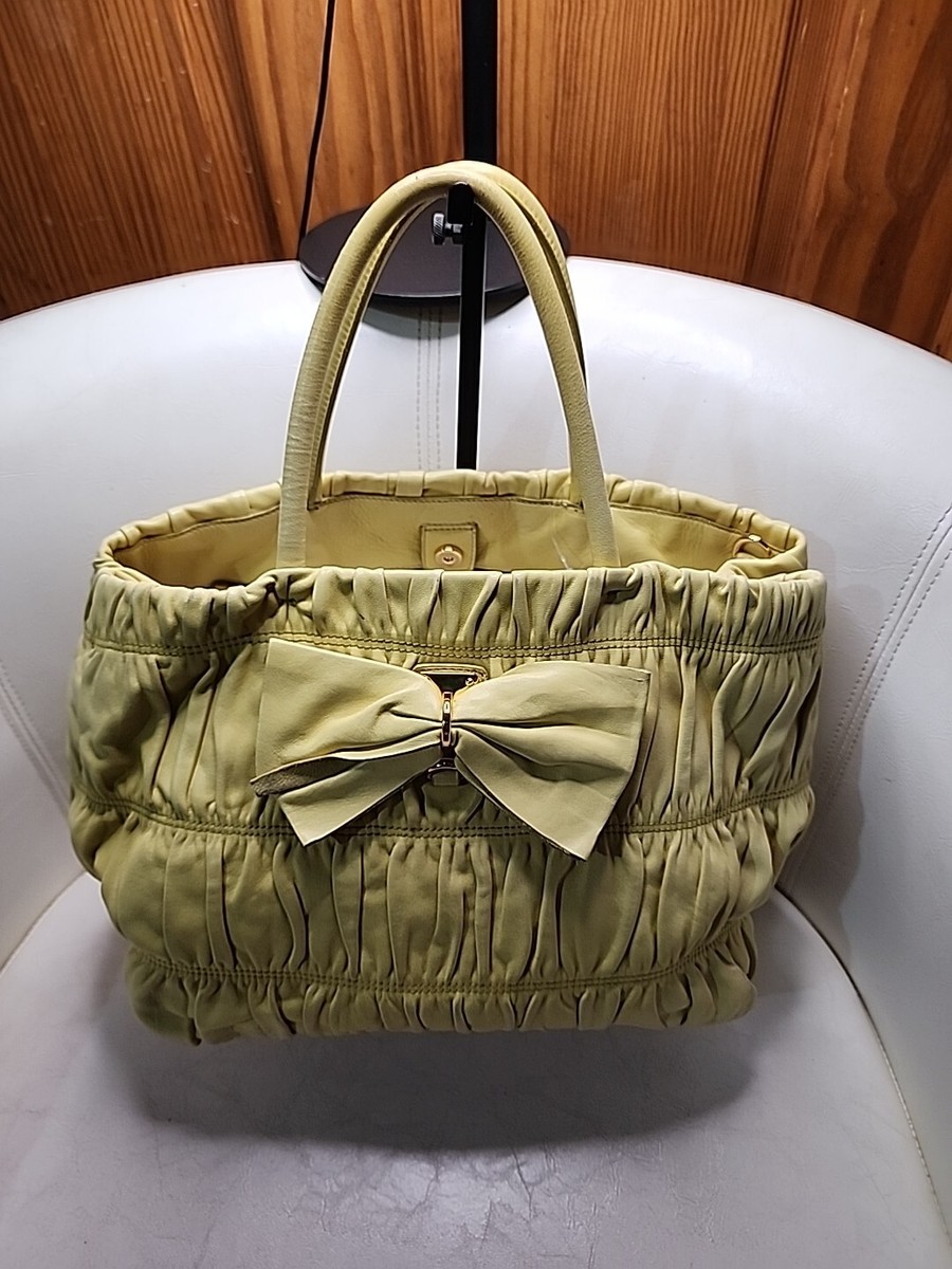 Vintage Preowned Prada Leather Gaufre Bow Yellow Handbag. No