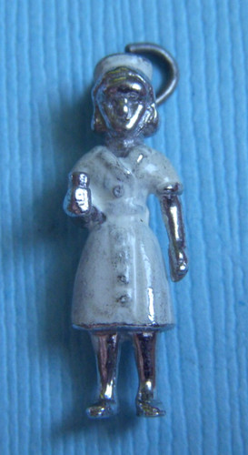 Vintage enamel nurse with cup sterling charm