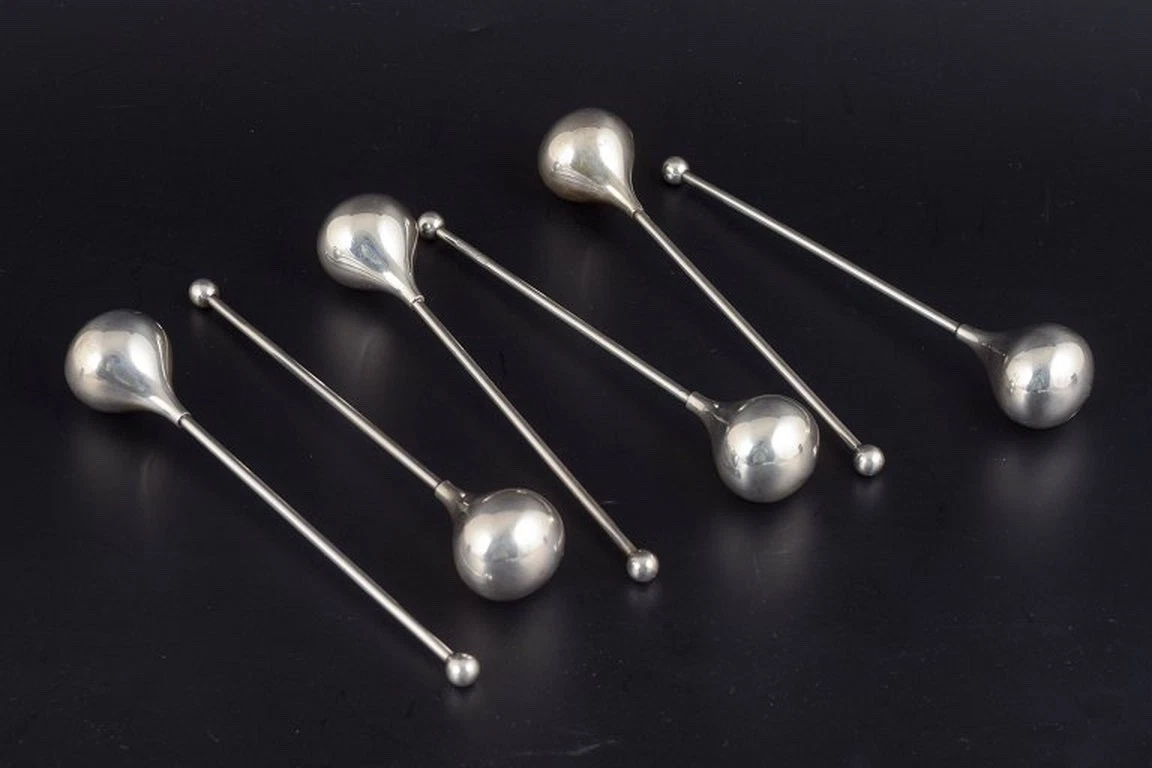 Piet Hein, Denmark. Six slim drink coolers in silver-plated metal. Ca. 1970s.