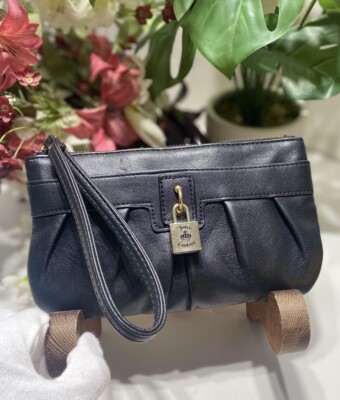 Juicy Couture Black Wristlet With Gold Tone Lock Accent