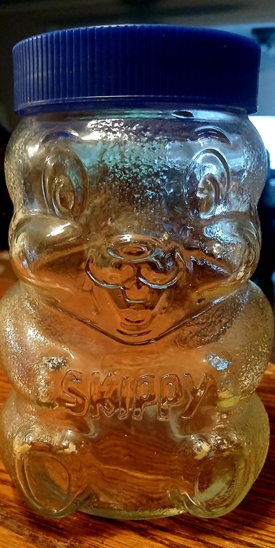 VINTAGE SKIPPY PEANUT BUTTER BEAR JAR BANK