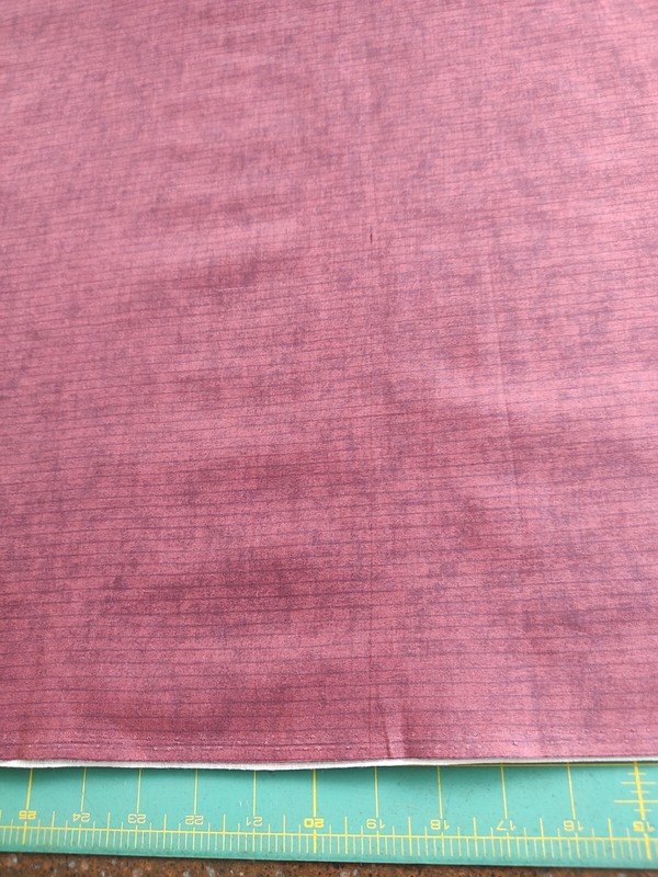 35" WOF Quilt shop fabric. No name salvage Pale Burgundy With Faint Stripes 