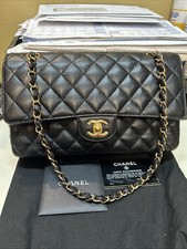 Chanel Quilted Medium Double Flap Black Caviar Shoulder Handbag