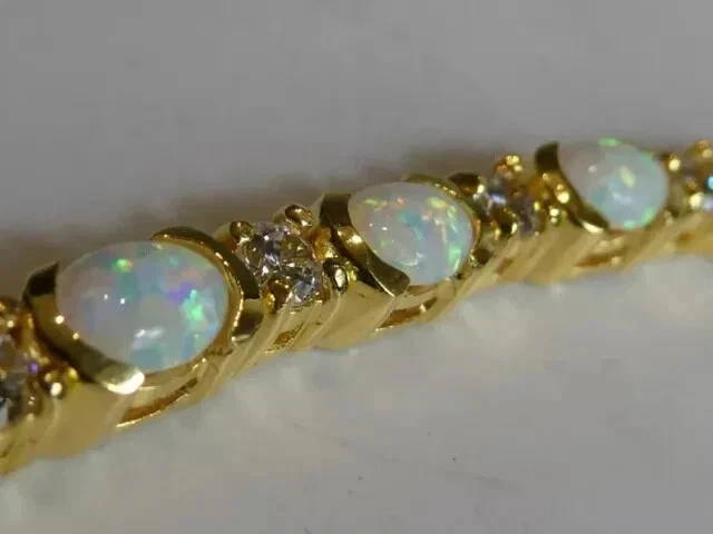 Pulseira de tênis 10 quilates corte oval criada em laboratório opala fogo presente folheada a ouro amarelo 14K - Imagem 4 de 4