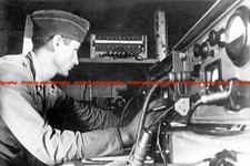 F019745 German Kriegsmarine sailor at radio measuring device c1944 WW2