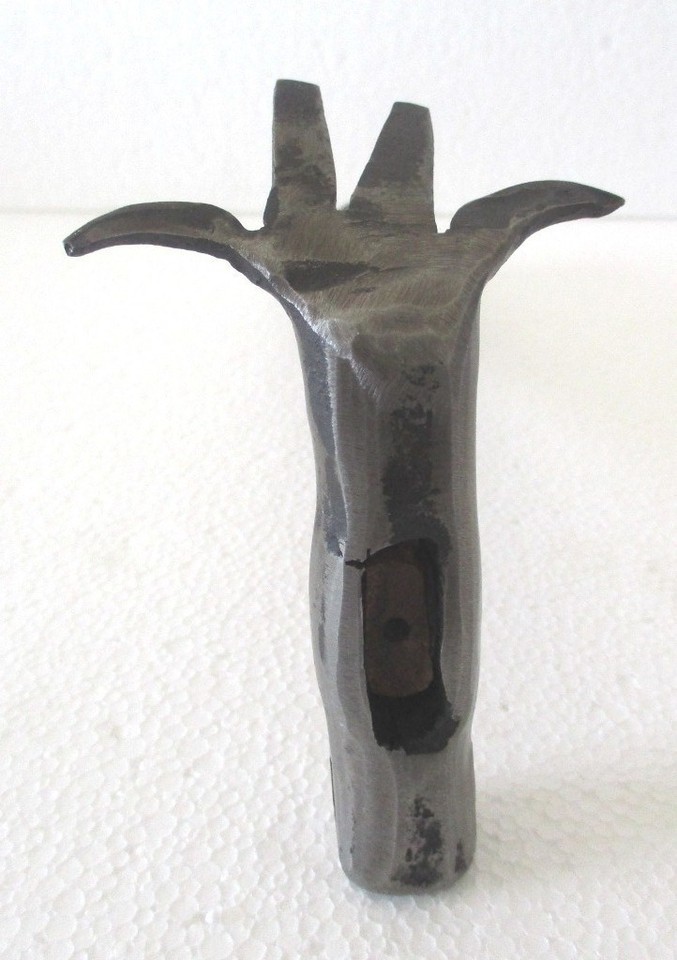 A rare antique figural hammer where the tool itself is shaped like a figure — functional folk art that's genuinely jaw-dropping.
