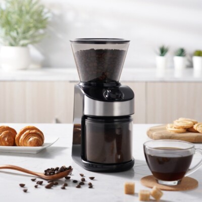 Capsule coffee machine, electric coffee machine, flat grinding disc grinder