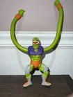 MOTU MASTERS OF THE UNIVERSE SSSQUEEZE SQUEEZE ACTION FIGURE VINTAGE 1986 HEMAN