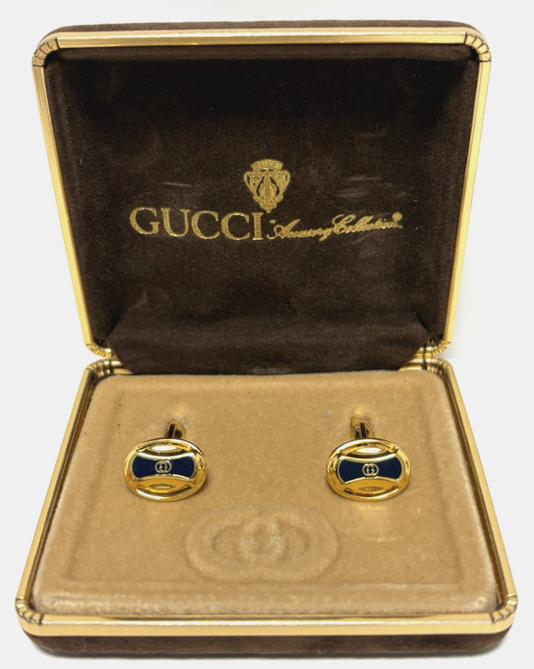Authentic vintage Gucci cufflinks, gold-plated with navy accents, sold with original box — a genuinely luxe and timeless men's gift from a heritage brand.