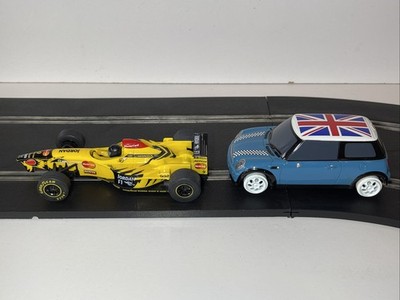 Scalextric 1/32 Mini und Jordan F1 Ersatzteile oder Reparatur beide funktionieren
