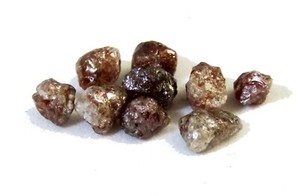 Diamante natural en bruto rojizo 0.5 cts