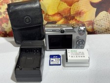 Canon IXY DIGITAL 900 IS Silver 7.1MP Digital Camera W/Battery Charger SD Case