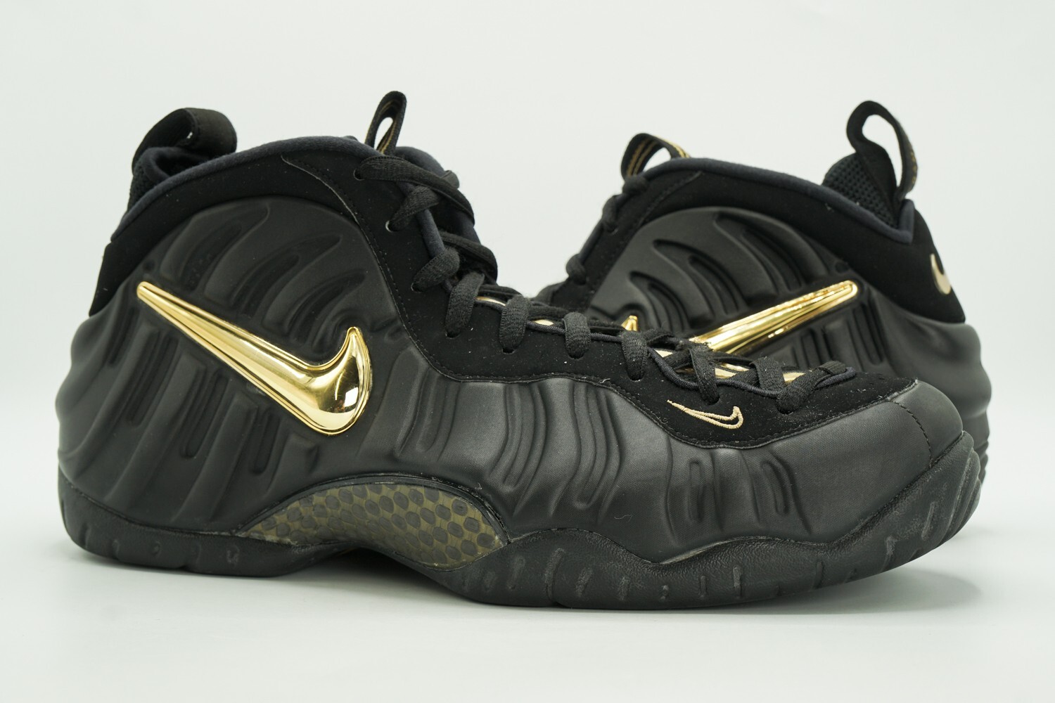 black and gold foamposite outfit