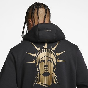 nike black and gold sweater