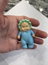 Little Tikes Dollhouse Baby dressed in Blue & Green outfit