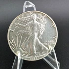 1987 American Silver Eagle 1 oz .999 Fine Silver Luster Light Haze Rim Toning