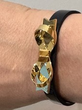 Beautiful Ted Baker Yellow gold and Navy leather Bow Bracelet