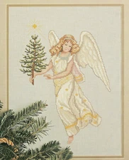 Angel of Love Heavenly host Holiday Cross Stitch Pattern pages from a magazine
