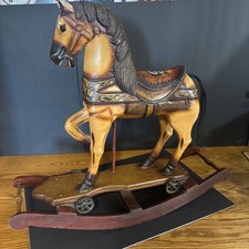Vintage Hand Carved And Painted Rocking Horse With Iron Wheels Rare Toy