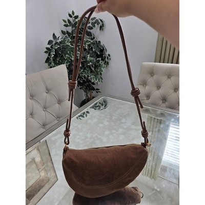 Brown Suede Crescent Shoulder Bag With Gold Zipper Knot Strap Detail