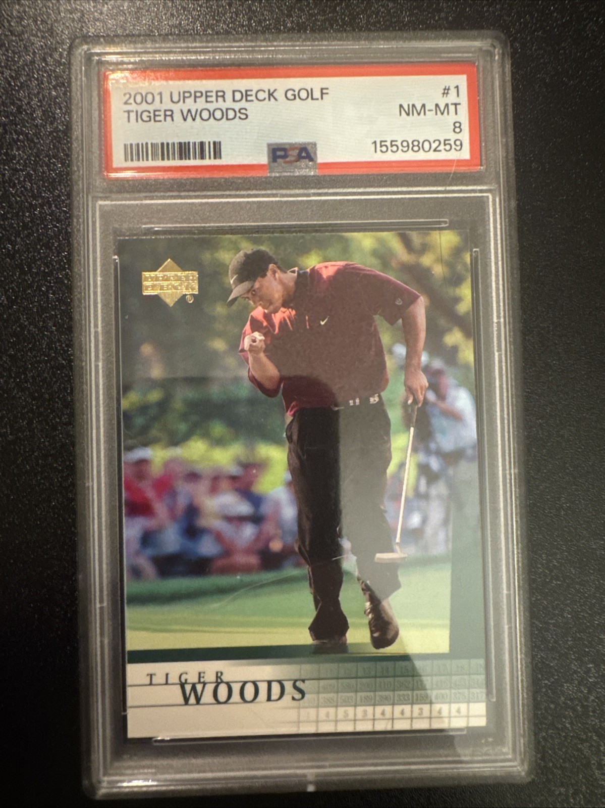2001 Upper Deck Tiger Woods #1 (RC) PSA 8