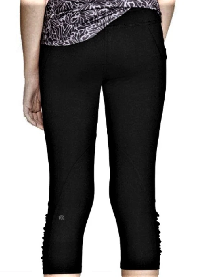 Leggings capri Champion C9 para niñas corte láser premium negros dúo elástico seco Foto 2 de 2