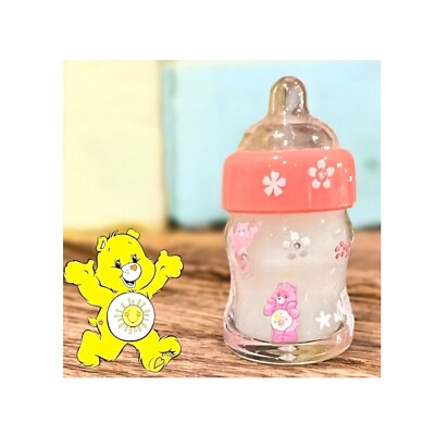 Micro Mini Sealed Baby Bottle with Real Liquid. Watch as baby drinks Care Bears