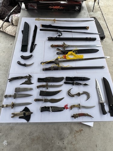 Personal collection of unsharpen swords, katanas daggers and collectible knifes