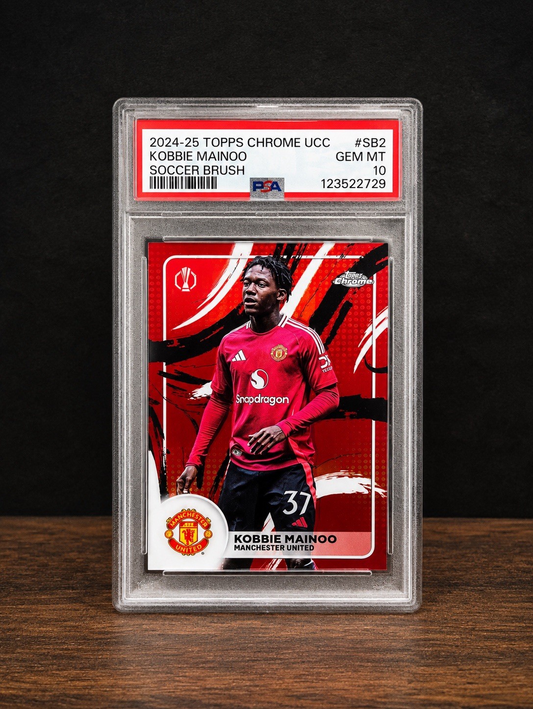 2024-25 Topps Chrome Uefa Club Competitions - Soccer Brush Kobbie Mainoo SSP view 1