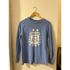 Camiseta Argentina Messi #10 Manga Larga | Cresta AFA Azul Claro | Talla Pequeña