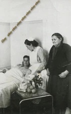 #35798 Greece 1950s. Three women (patient, nurse, visitor) / hospital. Photo