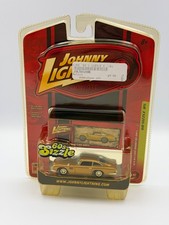 Johnny Lightning 60's Sizzle 1964 Aston Martin DB5, Gold, 1:64, NIB