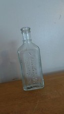 VINTAGE RAWLEIGH'S CLEAR GLASS MEDICINE BOTTLE, TRADEMARK, MADE IN THE USA
