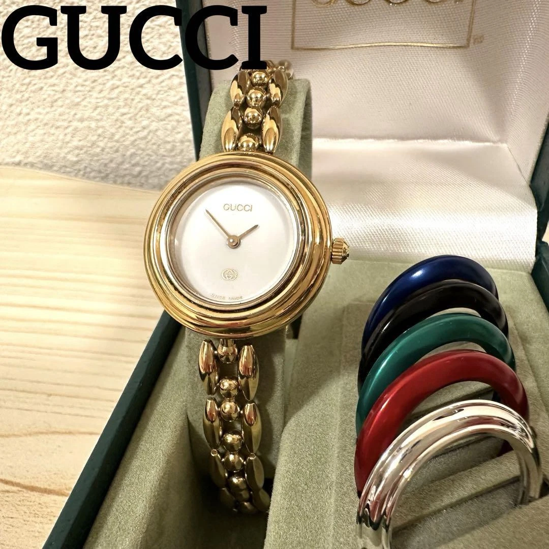 montre GUCCI 11/12 lunette changeante piles neuves fonctionne quartz
