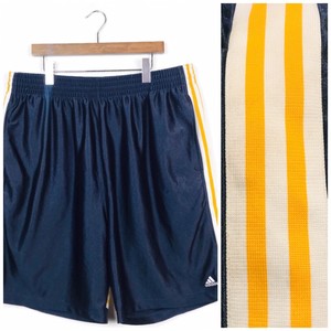 adidas black shorts with yellow stripes